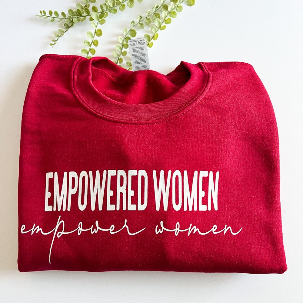 Women’s Heavy Red Sweatshirt. Empowered Women Empower Woken graphic sweatshirt